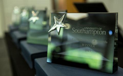 Photo of glass VLE award trophies.