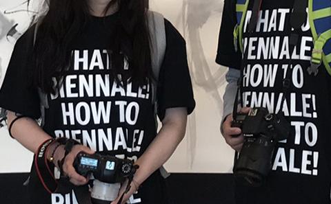two students in How to Biennale! T-shirts