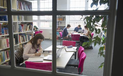 students working in the library