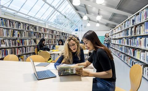 Students reading in the library
