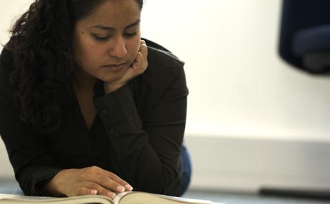 Student reading a book