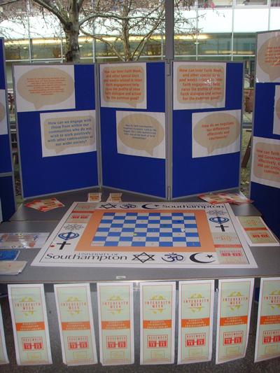 Image of a stand with information on the Interfaith Week at the University of Southampton