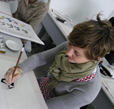 Graphic Arts student Beth Salter tries Chinese ink painting