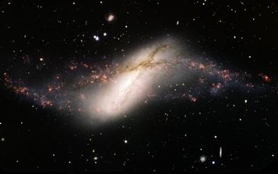 A composite optical image of the polar ring galaxy NGC 660, made using the Gemini Multi-Object Spectrograph on the Frederick C. Gillett Gemini North Telescope, in August 2012.