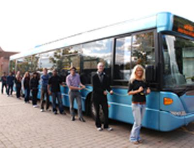 (front/far right) and fellow students checking out the tri-axle uni-link bus.