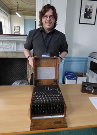 Tom Briggs with the real Enigma machine