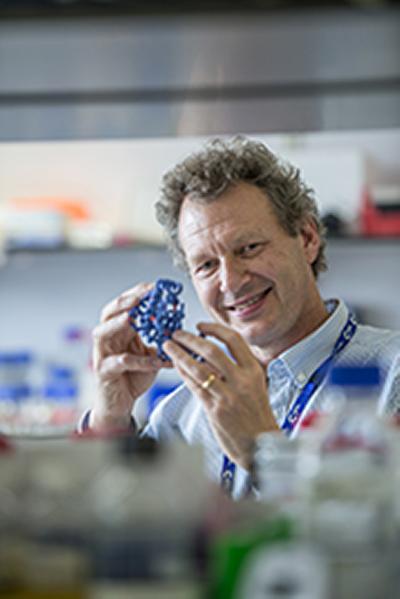 Professor Tim Elliott in a lab
