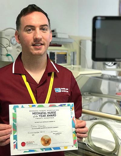 Colm with his Neonatal Nurse of the Year Award 2017 certificate