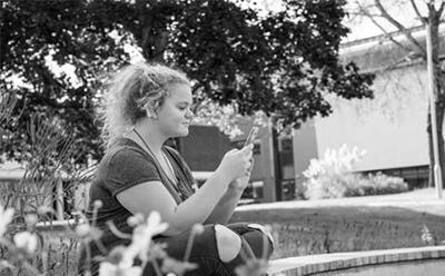 Student on her mobile