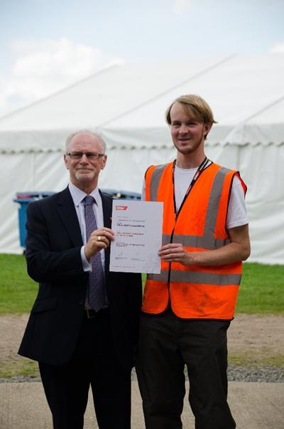 IMeche President presenting the traction challenge award to Tom Parker