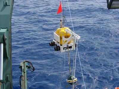 Ocean bottom seismometers being recovered.