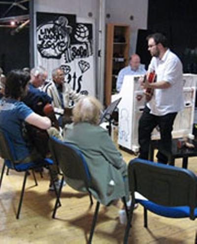 Dr Ben Oliver (guitar) and Professor David Nicholls leading the Musical Building Block workshop