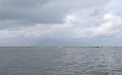 Remains of Walande Island in 2019