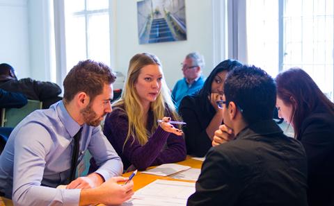 Students sat around a table
