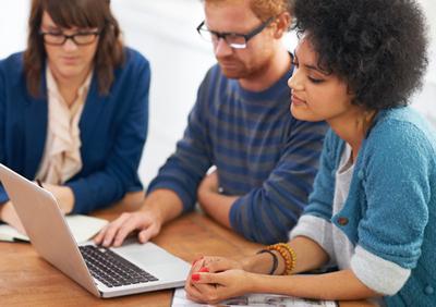 Employees at computer