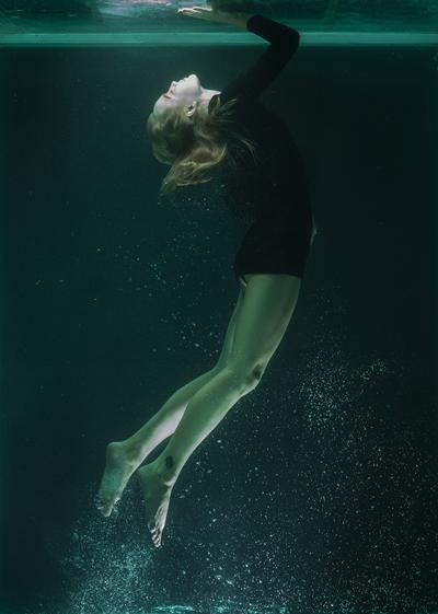 Woman swimming underwater