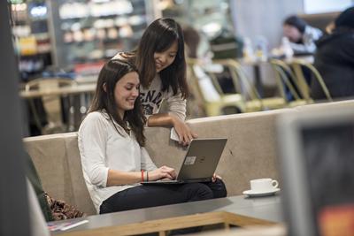 Photo of students on laptop
