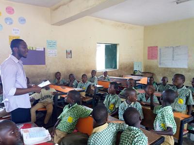 Teacher and pupils in classroom
