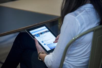 Student looking at an ipad