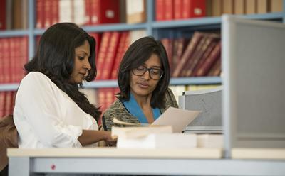 Two students in the library