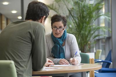 Student talking with an advisor