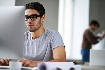 Student at a computer typing