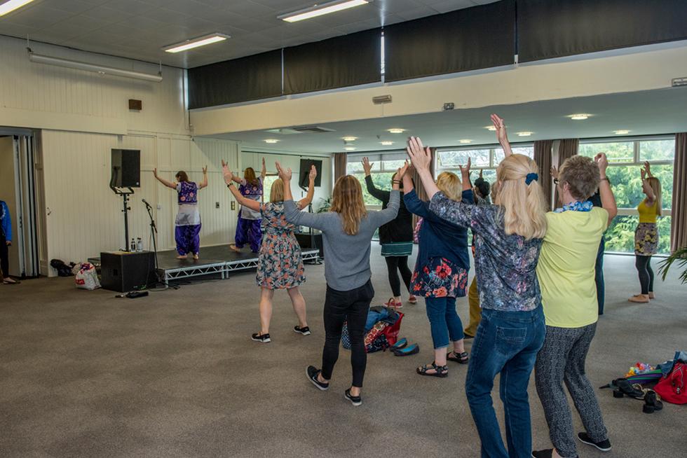 Staff joining in at the Bhangra workshop