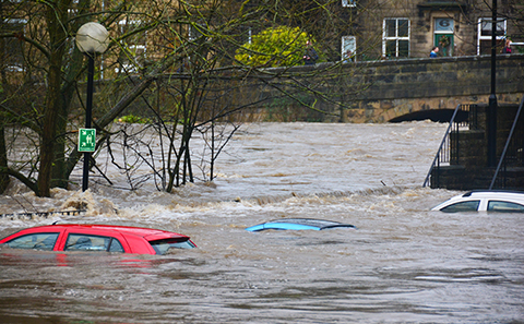Cars under mirky water