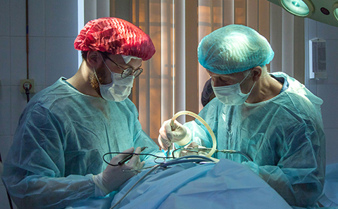Cancer surgeons in hospital theatre