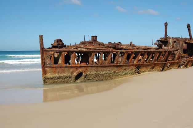 Rusty shipwreck on a beach