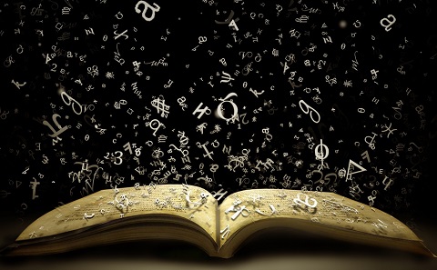 Open book with rain of letters