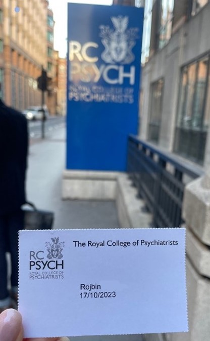 Entry card for Rojbin outside Royal college of Psychiatrists