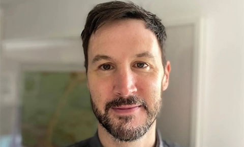 Professor Andrew Power looking at camera.