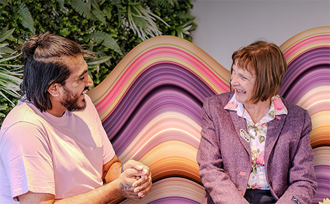 Two people talking in a career mentoring meeting 