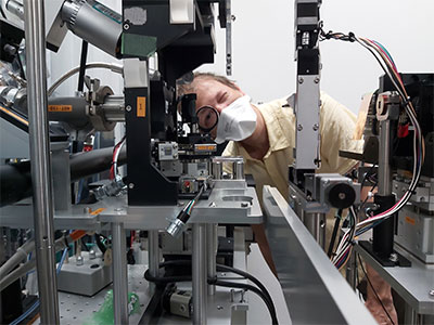 Ivo Tews looking through equipment.