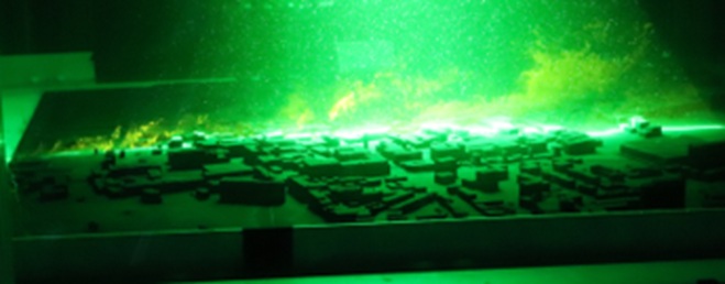 planar laser-induced fluorescence (PLIF) visualisation of flow dispersion around an urban model in a recirculating water tunnel
