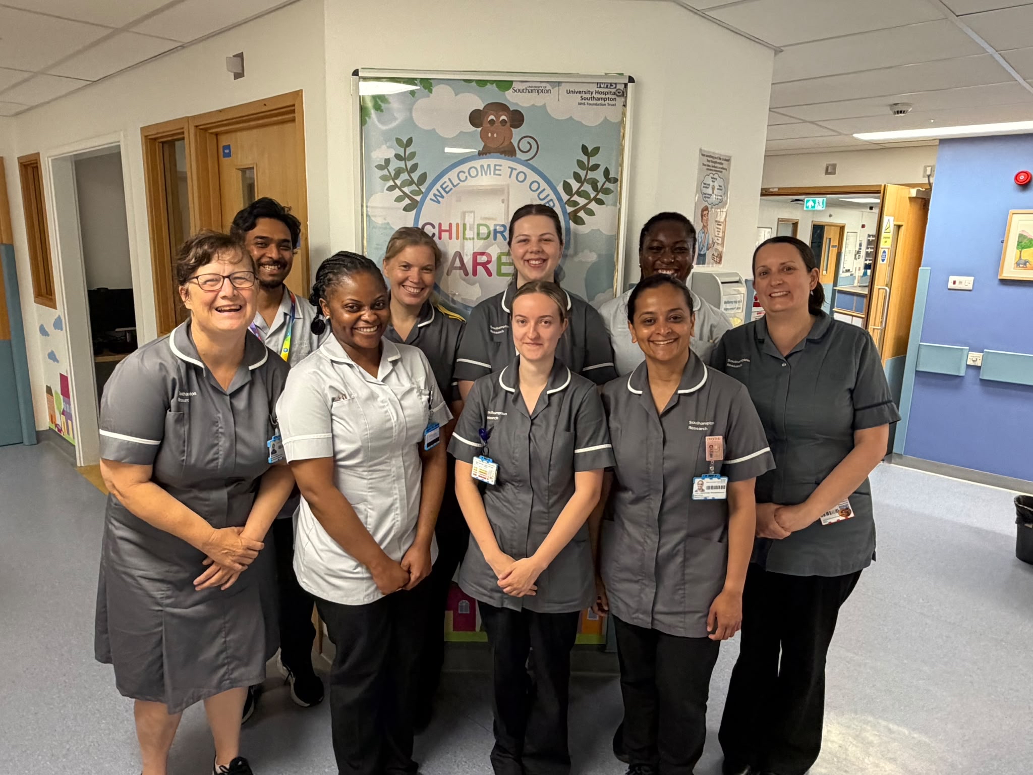 THe inflamatory bowel disorder pediatric nursing team smile at the camera