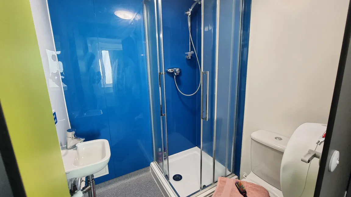 Enhanced plus shared bathroom with wash basin