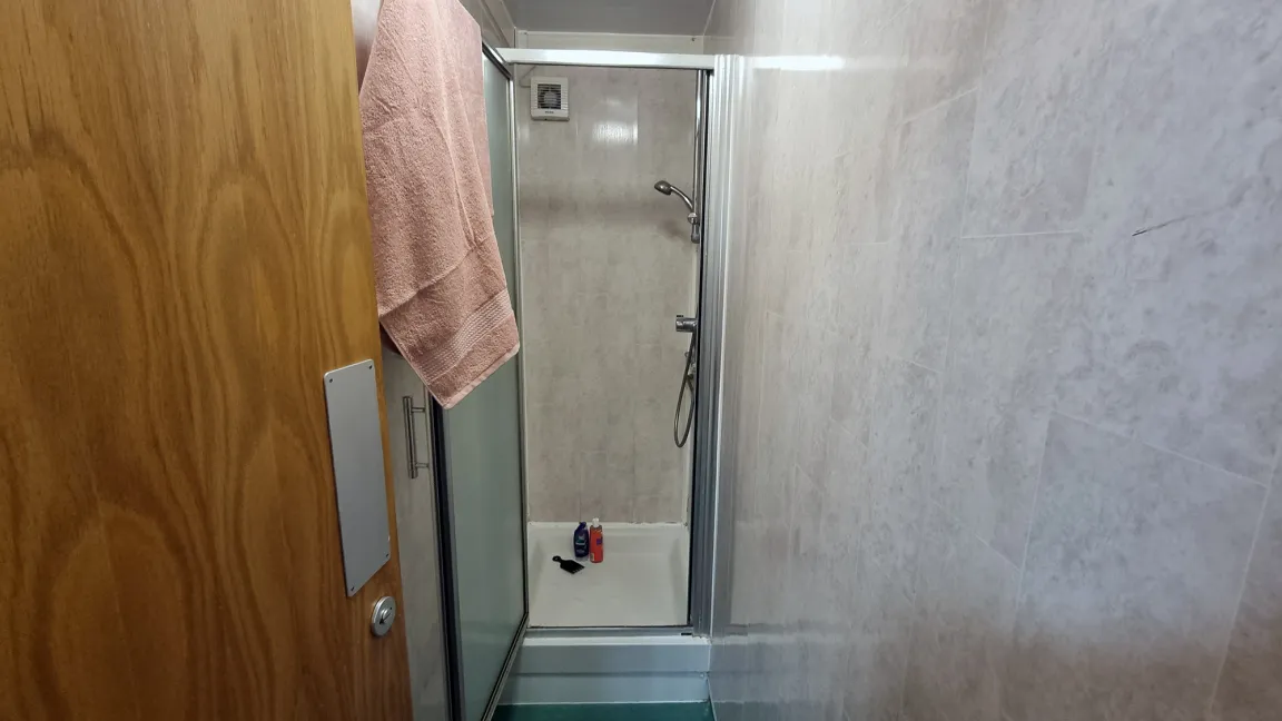 Enhanced shared bathroom with wash basin