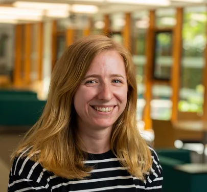 Head and shoulders portrait of Charlotte Cordery smiling at the camera.