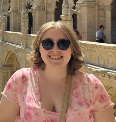 Head and shoulders portrait image of Emily Haines-Furse, BA Archaeology and Ancient History Year Abroad student, smiling at the camera.