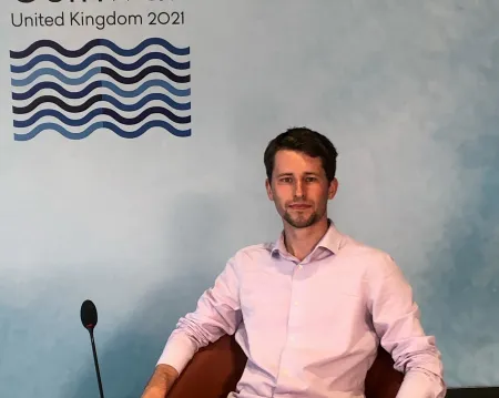 Head and shoulders portrait image of Jacob Brooks, BA History and French graduate, at the G7 Leaders’ Summit in Cornwall in 2021.