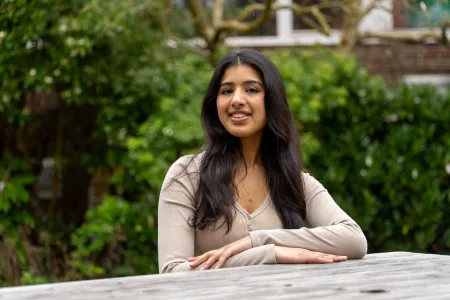 Anushree Sheth sitting outside