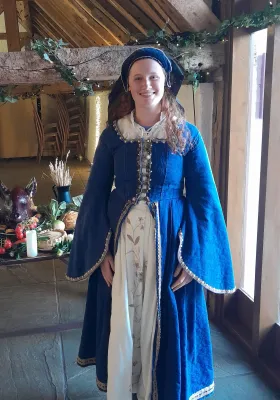 Joanna in medieval dress in the hall at Ufton Court