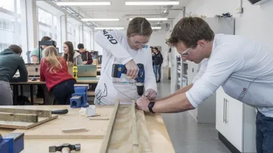 Students work on a project in a design studio