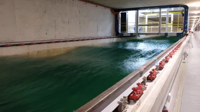 The towing tank in use, with waves.