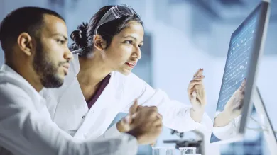 Image showing two doctors looking at a computer screen.