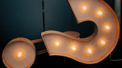 A large question mark on it's side containing lights