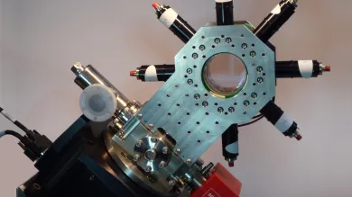 Prototype rotation sensor using atom matterwave interferometry, mounted for testing in a precision rotation stage aligned with the Earth’s axis 