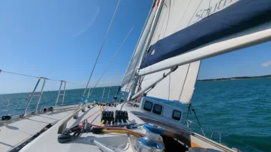 Looking out over the bow of a yacht at sea